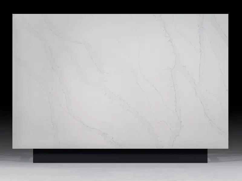 Calacatta Romano Quartz countertop with elegant golden veining on a pristine white base, ideal for luxurious kitchen and bathroom designs.