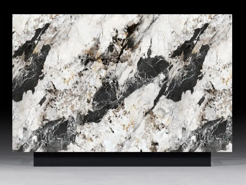 High-contrast Panda White quartz slab featuring bold charcoal black ink-wash veining on an icy white base for luxury interiors.